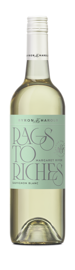 A Sauvignon Blanc wine bottle with a white cap and light green label with beautiful cursive writing of Rags to Riches in grey for Byron & Harold wines.