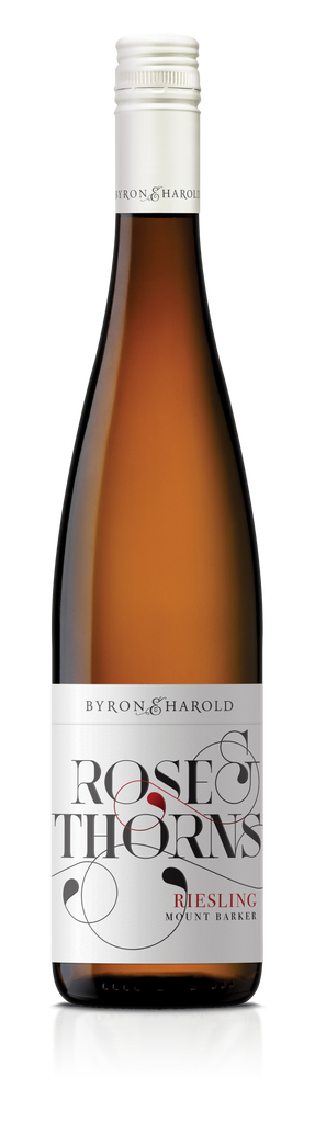 A Riesling wine bottle from Great Southern with a white cap and a white label with an intricate design of Rose and Thorns in black for Byron & Harold wines.