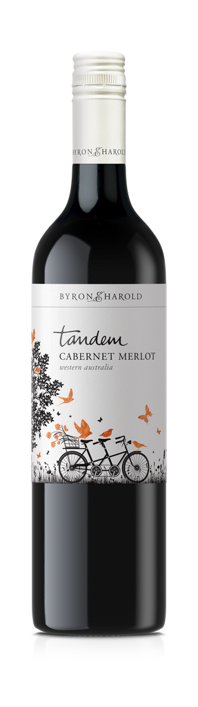 A Merlot bottle from Western Australia with a white cap and a white label with an illustration of a Tandem bike with orange birds and butterflies for Byron & Harold wines.